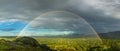 Full double rainbow above the valley