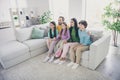 Full dream cozy loving family sit couch daddy mommy sit couch hug embrace her preteen small kids girls boys in house Royalty Free Stock Photo