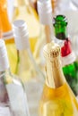 Full and empty bottles of different alcoholic drinks, abuse and alcohol addiction Royalty Free Stock Photo