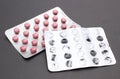 Full and empty pill blister on black background Royalty Free Stock Photo