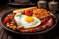 A full English breakfast, consisting of bacon, fried egg