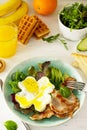 Full  English breakfast - fried egg, fried bacon, spinach, arugula, avocado, toast and orange juice Royalty Free Stock Photo