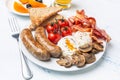 Full English Breakfast with Poached Eggs Royalty Free Stock Photo