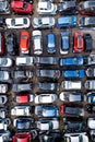 Full frame aerial view directly above rows of scrap metal cars