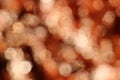 Full frame background blurred copper or rose colour bokeh image Royalty Free Stock Photo