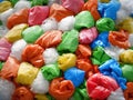 Background of Pile of Colorful Rolled Plastic Bags