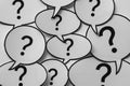 Full frame background of speech bubbles with question marks