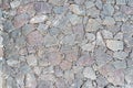 Close-up of uneven dry stone wall background Royalty Free Stock Photo