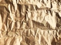 Full frame of dramatic brown crumpled paper looks like rock