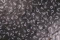 Full frame image of black paper with QUESTION MARK for background