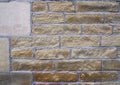 Full frame image of an old yellow sandstone wall made of large blocks