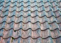 Full frame image of traditional old terracotta curved overlapping pantile roof tiles