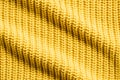 full frame image of wavy yellow woolen