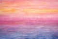 full frame of layered watercolor in a gradient of sunset hues