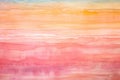 full frame of layered watercolor in a gradient of sunset hues
