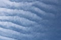 Full frame of pretty blue sky with unusual scudding cloud formation Royalty Free Stock Photo