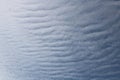 Full frame of pretty blue sky with unusual scudding cloud formation Royalty Free Stock Photo