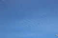 Full frame of pretty blue sky with unusual scudding cloud formation Royalty Free Stock Photo