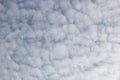 Full frame of pretty blue sky with unusual scudding cloud formation Royalty Free Stock Photo