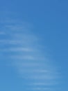 Full frame of pretty blue sky with unusual scudding cloud formation Royalty Free Stock Photo