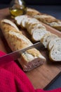 Close-Up Of Baguettes on cutting board with knife Royalty Free Stock Photo