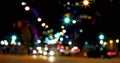 Full frame shot of defocused road with multicolored illuminated street lights in city at night