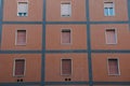 full frame shot of facade of european building with shuttered windows,