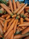 fresh orange carrots (daucus carota) for sale at the market