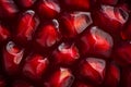 Full frame shot of pomegranate seeds. Abstract photo of a close-up of neatly arranged pomegranate seeds. Background texture of a