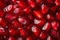 Full frame shot of pomegranate seeds. Abstract photo of a close-up of neatly arranged pomegranate seeds. Background texture of a