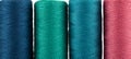 Full frame of spools with colored thread. Royalty Free Stock Photo