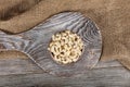 Full frame top view of large amount of raw delicious cashews placed on smooth surface. Pile of shelled cashew nuts in copper bowl Royalty Free Stock Photo