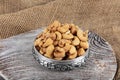 Full frame top view of large amount of raw delicious cashews placed on smooth surface. Pile of shelled cashew nuts in copper bowl Royalty Free Stock Photo