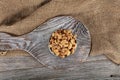 Full frame top view of large amount of raw delicious cashews placed on smooth surface. Pile of shelled cashew nuts in copper bowl Royalty Free Stock Photo