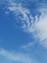 Full frame of pretty blue sky with unusual scudding cloud formation Royalty Free Stock Photo