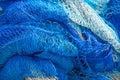 Full frame view of blue/white fishing nets. Royalty Free Stock Photo