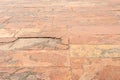 Full frame view of red sandstone ground tiles at the Tomb of Akbar the Great in Agra on overcast day Royalty Free Stock Photo