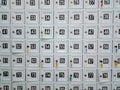 Full frame of white lockers with numbers and colorful key hang for storing visitor shoes Royalty Free Stock Photo