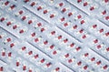 Full frame of white-red capsule pill in aluminum foil blister pack. Prescription drug. Pharmaceutical industry. Pharmaceutical