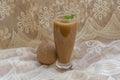 Full Glass Of Sapodilla Smoothie and Fruit