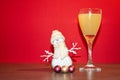 A full glass with a snowball on the kitchen table at the New Yea Royalty Free Stock Photo