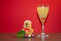 A full glass with a teddy bear on the kitchen table at the New Y Royalty Free Stock Photo