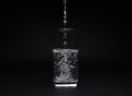 Full glass of water isolated on black background Royalty Free Stock Photo