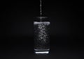 Full glass of water isolated on black background Royalty Free Stock Photo