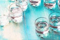 Full glasses with alcohol on a blue table Royalty Free Stock Photo