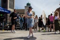 Full Gospel Church Christian Community evangelist female dancing with an umbrella in Warsaw, Poland - May 28, 2023