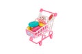 Full grocery toy cart. On a white background, isolated