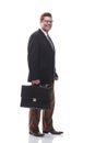 Confident business man with a briefcase . isolated on a white background Royalty Free Stock Photo