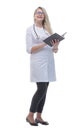 In full growth. female doctor reading medical records. Royalty Free Stock Photo