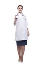 in full growth. female doctor showing her visiting card. Royalty Free Stock Photo